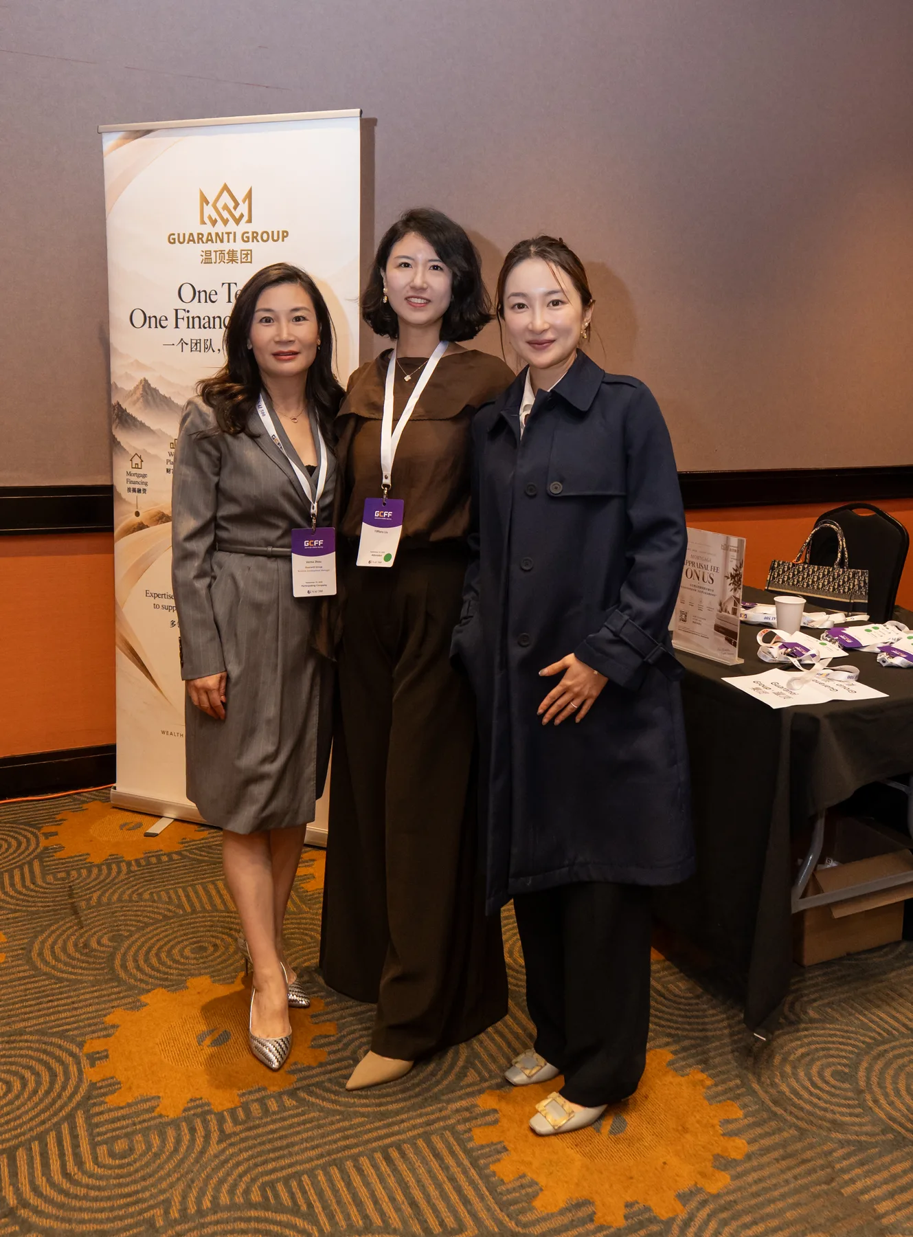 Guests together at the Guaranti booth