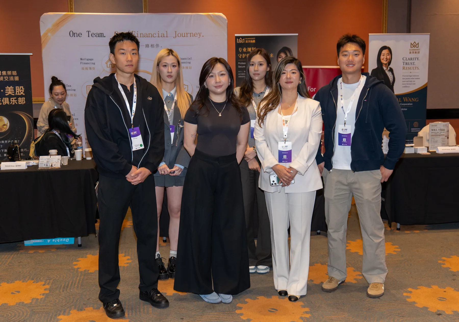 Young professionals together at the Guaranti booth