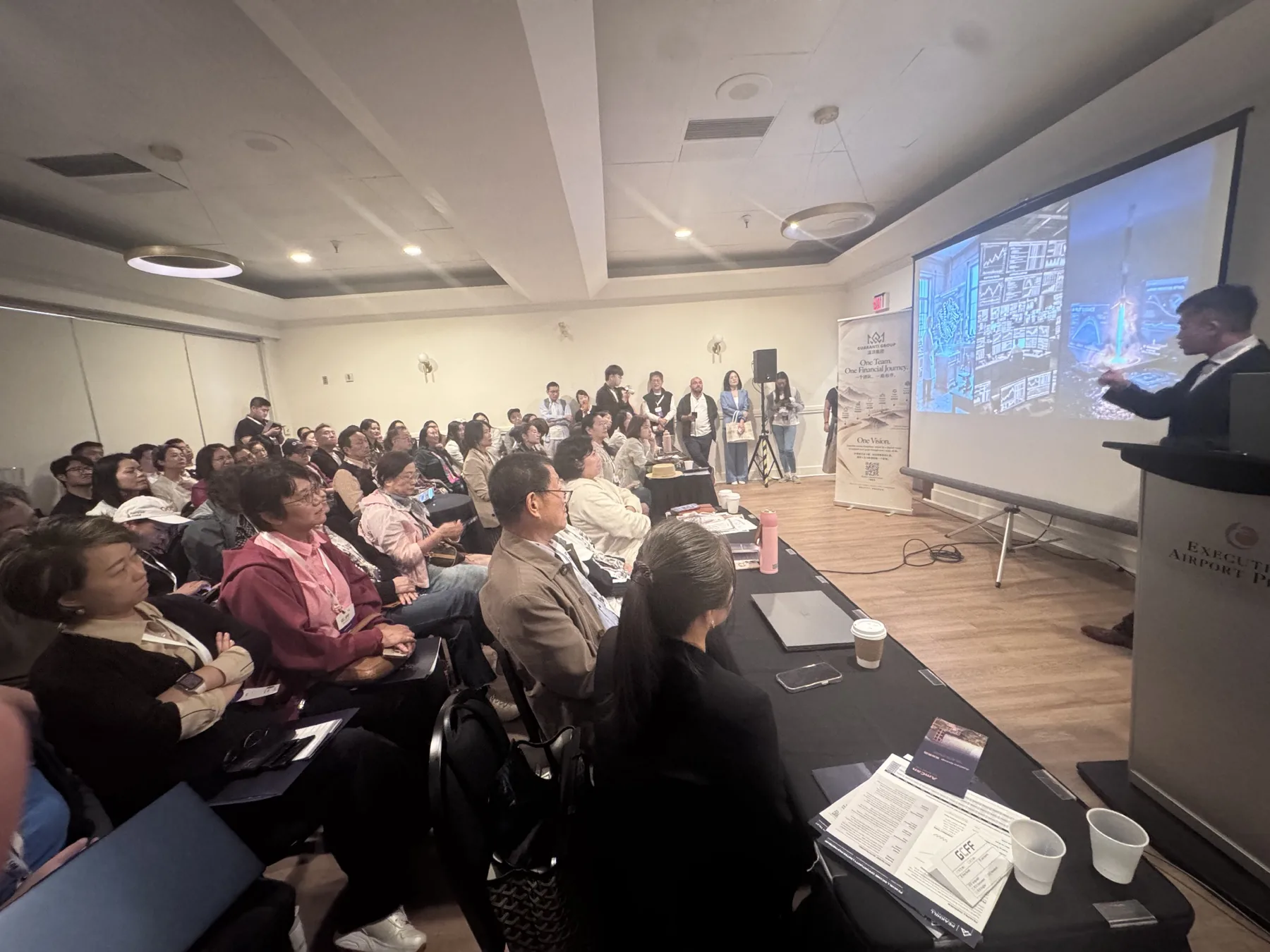 A full audience attending a Guaranti professional seminar
